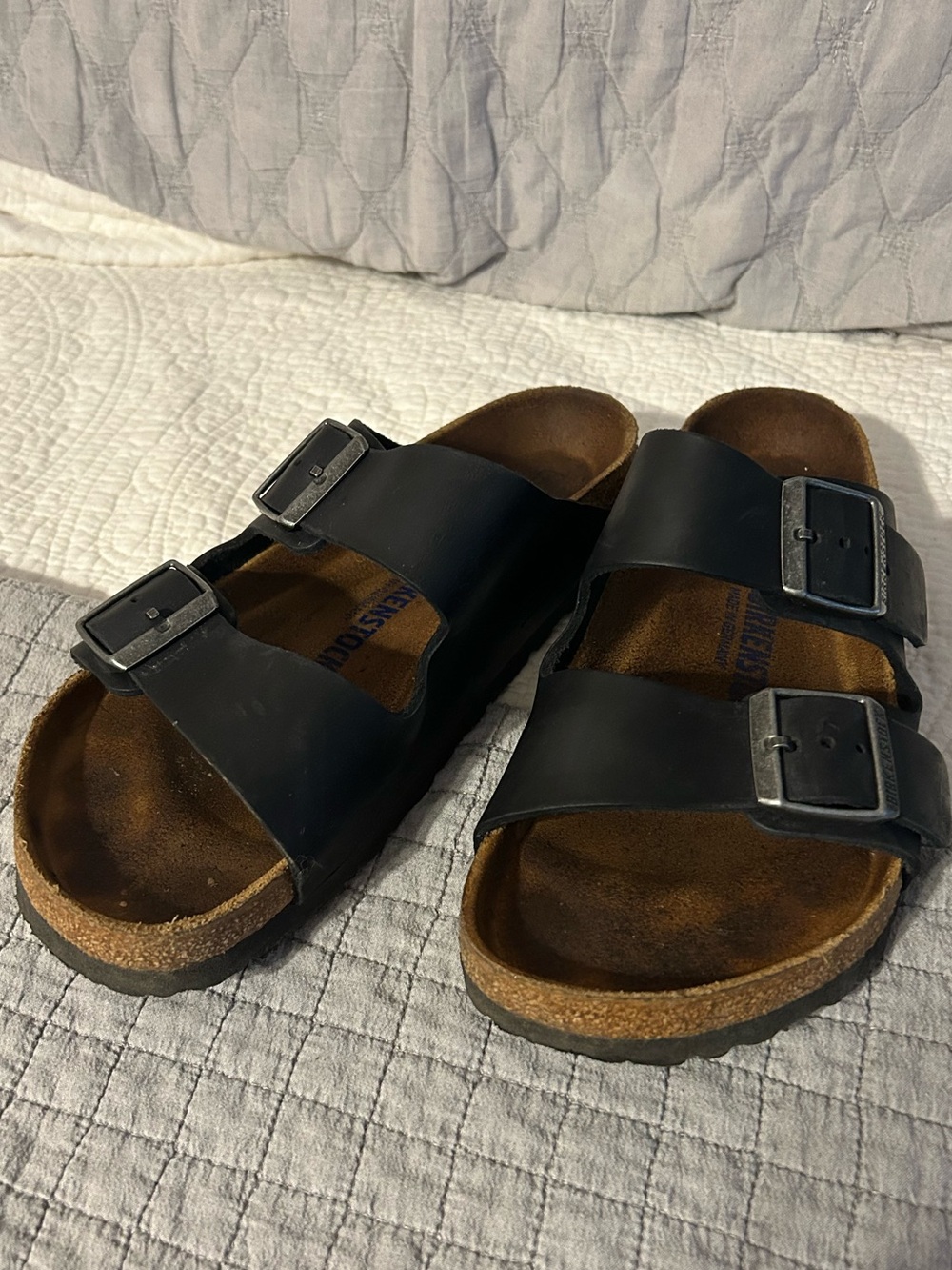 Classic Birkenstock sandals with black leather.